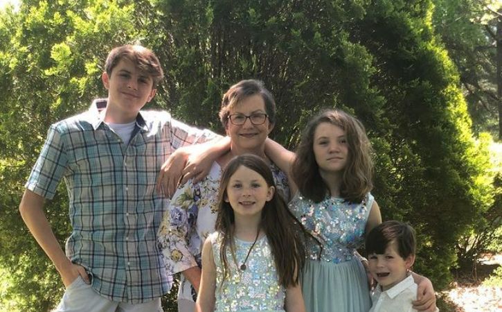 Wil Deusner (Top Left) with his four family memvers